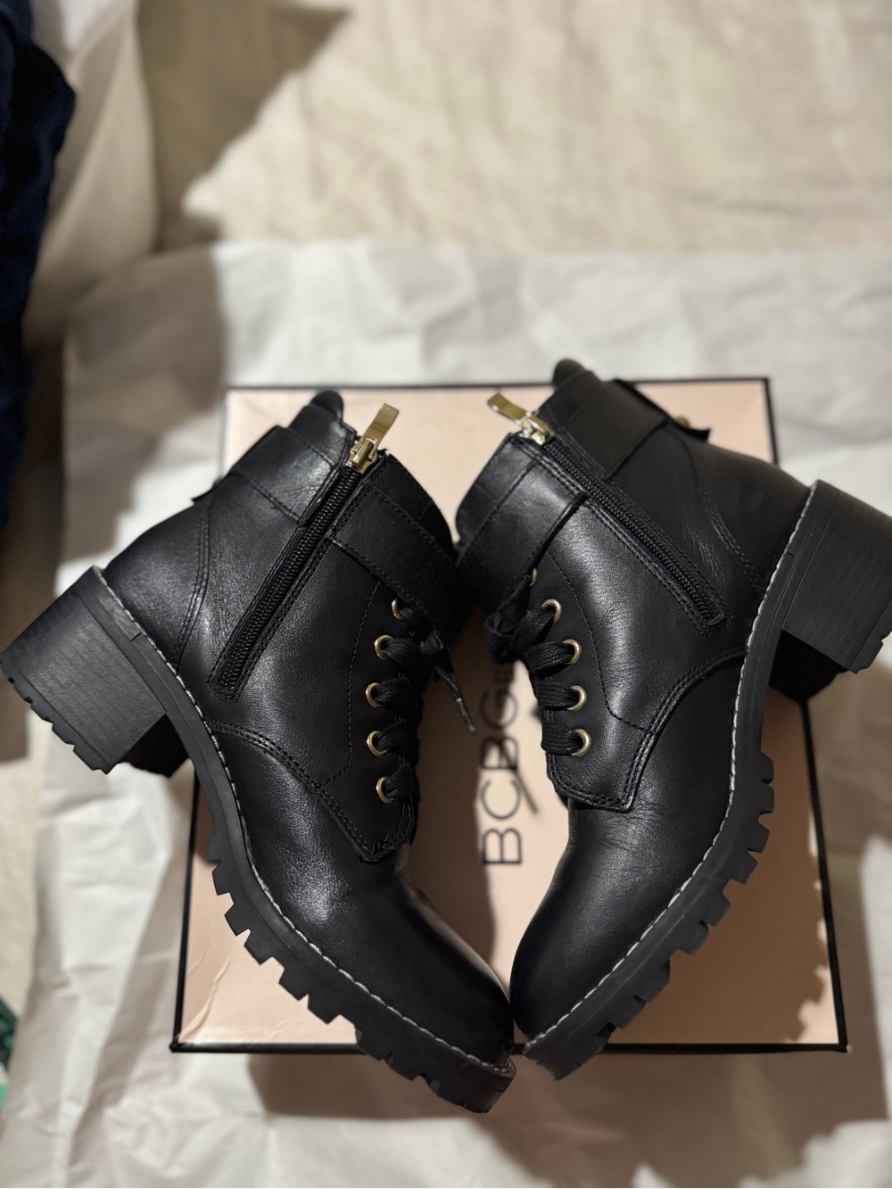 BCBGeneration Black Lace-Up Combat Boots with Gold Buckle Accent